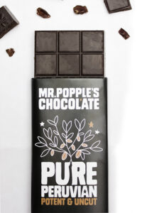Pure Peruvian Chocolate bar with cacao nibs and chocolate squares