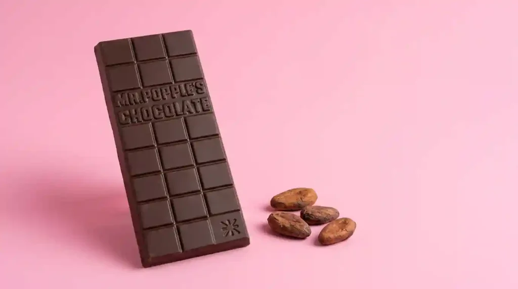 35g Mr Popples Chocolate bar with cacao beans pink background2
